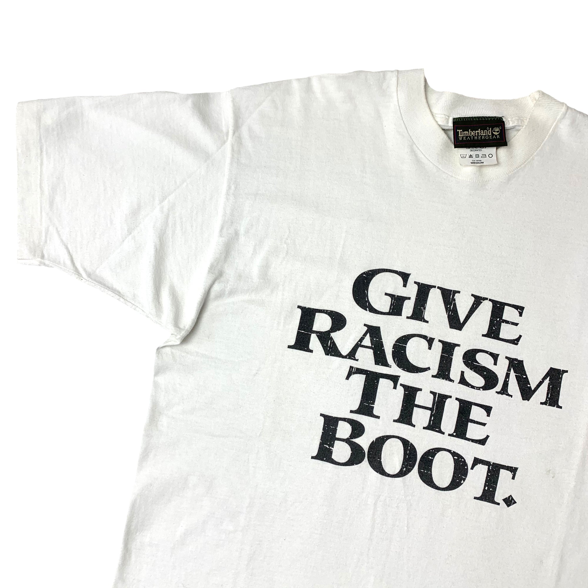 90's Timberland Give Racism the Boot. T-Shirt