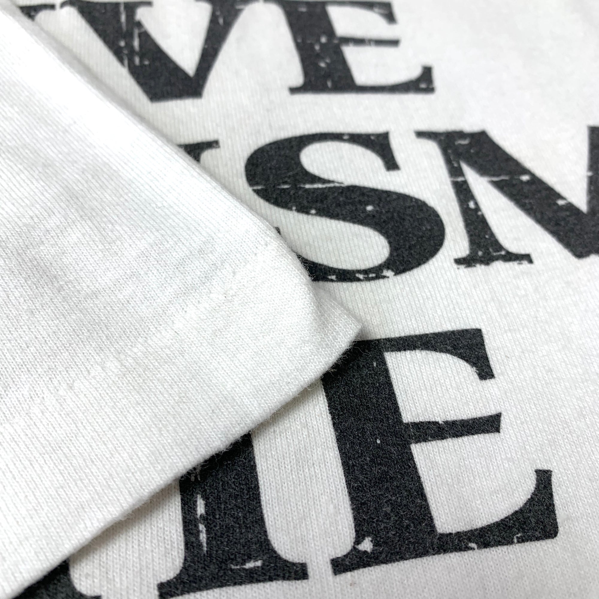 90's Timberland Give Racism the Boot. T-Shirt